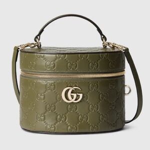 Gucci GG embossed leather vanity bag